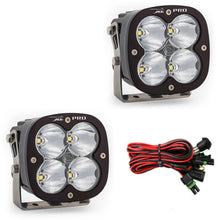 Load image into Gallery viewer, Baja Designs XL Pro Series LED light pods with high-speed spot pattern, featuring four powerful lights and wiring harness.