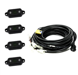 Baja Designs Universal Green Rock Light Kit with four LED lights and wiring harness for offroad vehicle illumination.