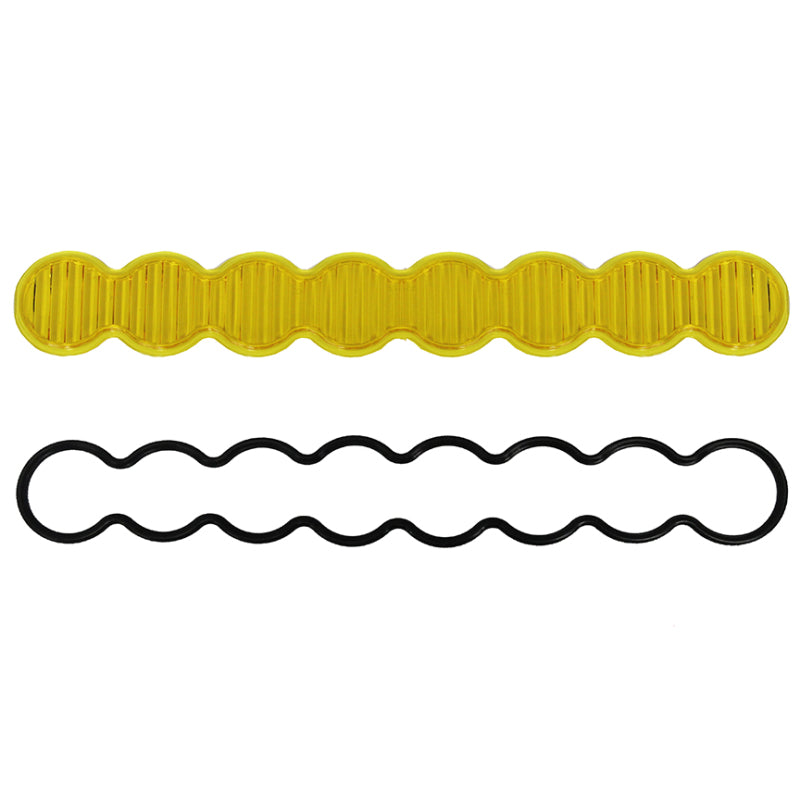 Baja Designs S8 Series Wide Driving Lens Kit in amber color, featuring a textured lens and black rubber gasket.