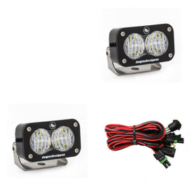 Baja Designs S2 Pro Series LED light pods with wide cornering pattern, includes a pair and wiring harness for installation.