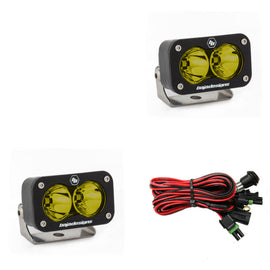 Baja Designs S2 Sport amber LED work lights with dual lenses and wiring harness for enhanced visibility and performance.
