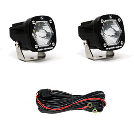 Baja Designs S1 Spot lights with mounting brackets and wiring harness for enhanced off-road visibility.