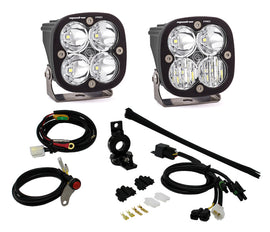 Baja Designs Adventure Bike 1in Squadron Kit Pro featuring two LED lights, wiring harness, and mounting accessories for enhanced visibility.