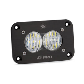 Baja Designs S2 Pro LED wide cornering flush mount light with dual lenses and durable black housing. Ideal for offroad vehicles.