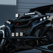 Load image into Gallery viewer, Baja Designs Can-Am Maverick R Clear 10in S8 Shock Tower Kit showcasing front lighting and rugged design for offroad performance.