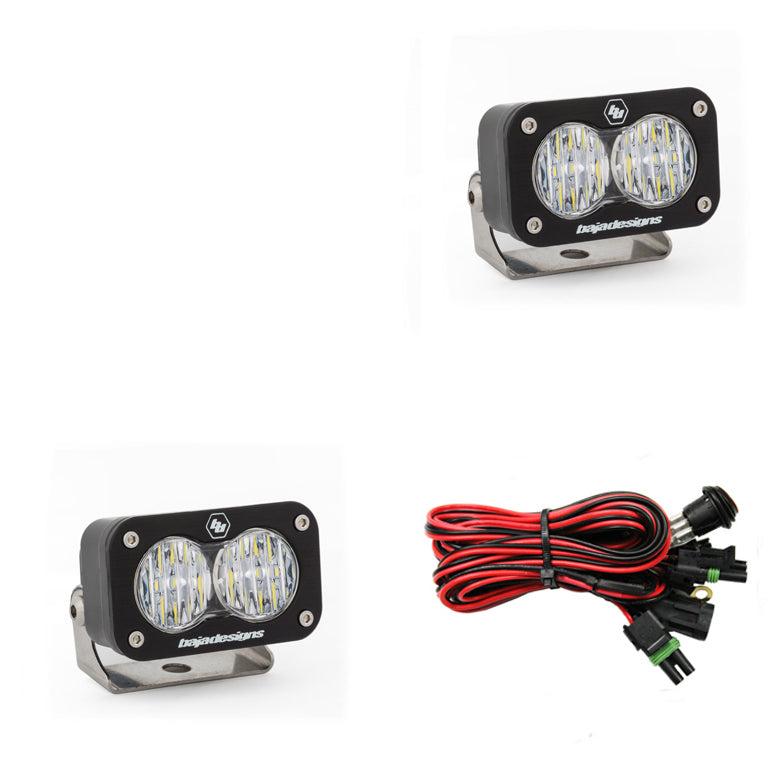 Baja Designs S2 Sport Pair Wide Cornering LED lights with mounting brackets and wiring harness for enhanced visibility.