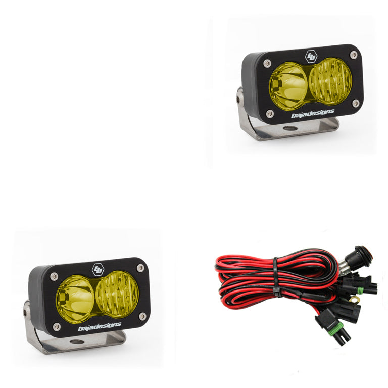 Baja Designs S2 Sport Pair Driving/Combo LED lights in amber, featuring durable housing and wiring harness for installation.
