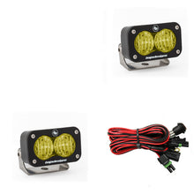 Load image into Gallery viewer, Baja Designs S2 Sport Pair Wide Cornering LED lights in amber with mounting brackets and wiring harness for offroad vehicles.