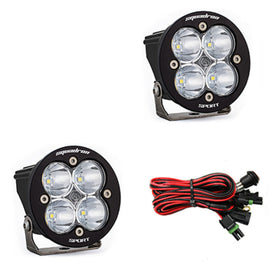 Baja Designs Squadron R Sport LED light pods with clear lenses, featuring four lights each and wiring harness included.