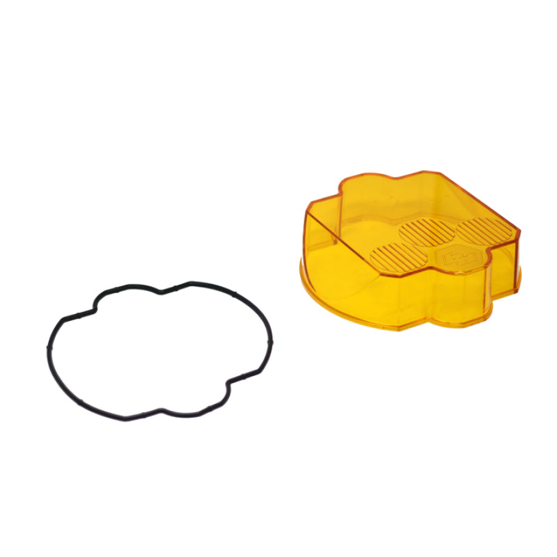 Amber lens cover and rubber gasket for Baja Designs LP9 Series driving lights, enhancing visibility and protection.