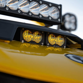 Baja Designs 2024+ Can-Am Maverick R S2 Pro Hood Light Kit featuring dual yellow lights mounted on a vehicle hood.