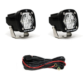 Baja Designs S1 LED light pair with mounting brackets and wiring harness for enhanced off-road visibility.