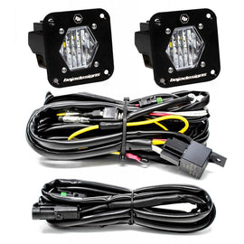 Baja Designs S1 Wide Cornering LED Light Backup Kit with mounting brackets and wiring harness for enhanced visibility.
