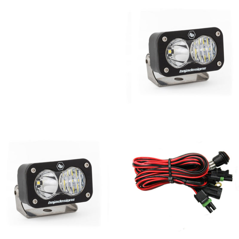 Baja Designs S2 Sport Driving Combo Pattern Pair LED work lights with clear lenses and wiring harness for installation.