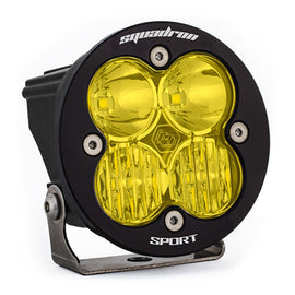 Baja Designs Squadron R Sport LED light pod with amber lenses, designed for driving and combo patterns, featuring a durable black housing.