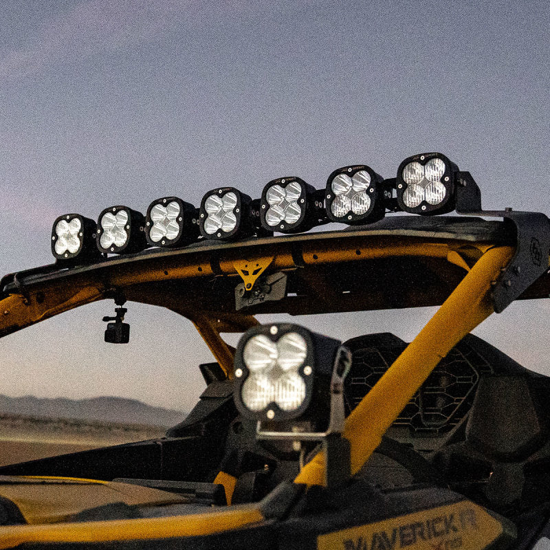 Baja Designs 2024+ Can-Am Maverick R 7XL Linkable Roof Mount Kit showcasing multiple powerful LED lights on a UTV.