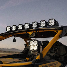 Load image into Gallery viewer, Baja Designs 2024+ Can-Am Maverick R 7XL Linkable Roof Mount Kit showcasing multiple powerful LED lights on a UTV.