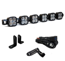 Load image into Gallery viewer, Baja Designs Polaris RZR Pro XP XL Linkable Roof Bar Kit featuring multiple LED lights, mounting brackets, and wiring harness.