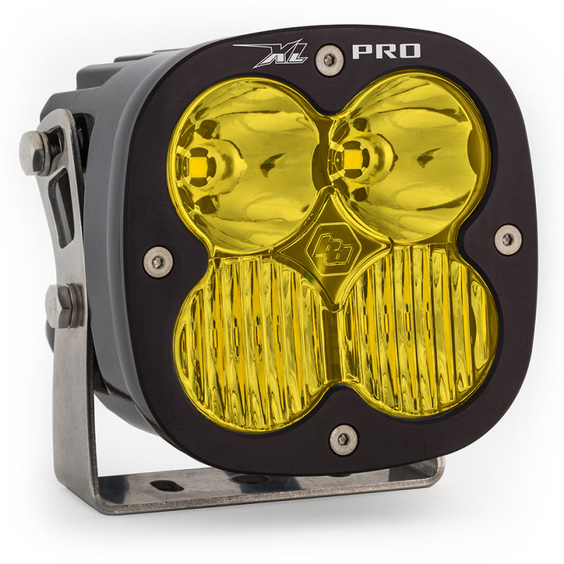 Baja Designs XL Pro amber LED light pod with dual lenses and sturdy metal bracket for offroad visibility.