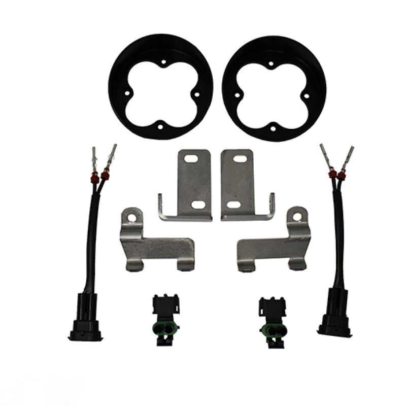 Baja Designs fog light mounting kit for 2014+ Toyota Tundra, including brackets, connectors, and wiring components.