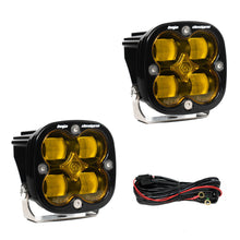 Load image into Gallery viewer, Baja Designs Squadron SAE off-road lights with yellow lenses and mounting brackets, designed for enhanced visibility.