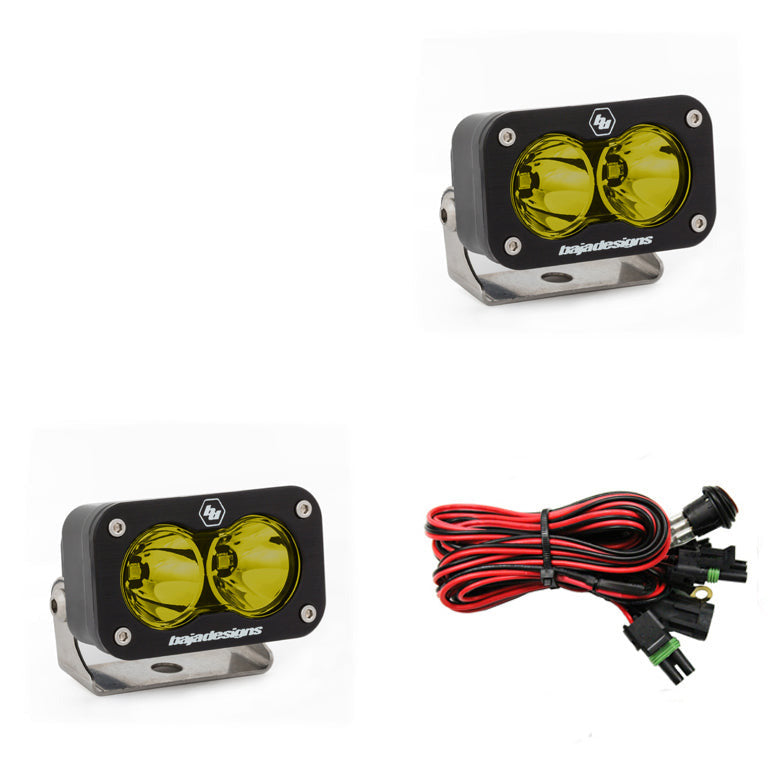 Baja Designs S2 Sport LED lights pair with yellow lenses and mounting brackets for enhanced off-road visibility.
