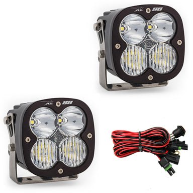 Baja Designs XL80 driving lights pair with combo beam pattern, featuring durable housing and wiring harness for easy installation.