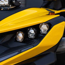 Load image into Gallery viewer, Baja Designs 2024+ Can-Am Maverick R S1 Headlight Kit featuring three high-performance lights on a yellow vehicle.