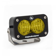 Load image into Gallery viewer, Baja Designs S2 Pro Wide Cornering Pattern LED light in amber, featuring a durable black housing and mounting bracket.