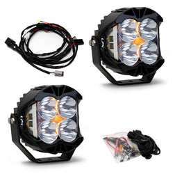 Baja Designs LP4 Pro Spot LED lights in clear, featuring a durable design and wiring harness for off-road vehicles.