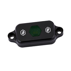 Baja Designs LED rock light in green, featuring a durable black housing and hexagonal design for offroad illumination.
