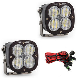 Baja Designs XL80 Series LED light pods with wide cornering pattern, featuring durable housing and wiring harness.