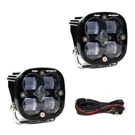 Baja Designs Squadron SAE LED auxiliary light pod pair with clear lenses and mounting hardware for enhanced visibility.