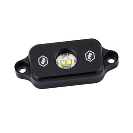 Baja Designs red LED rock light designed for offroad vehicles, featuring a durable housing and bright illumination.