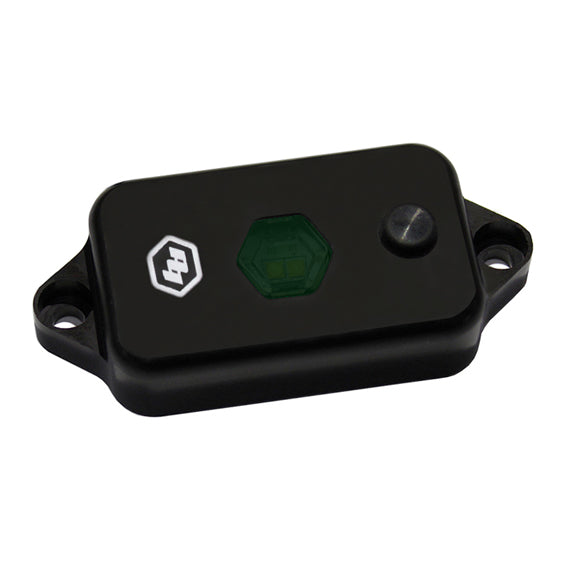 Baja Designs LED dome light with switch in black housing and green lens, designed for offroad vehicles and easy installation.