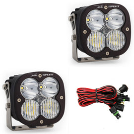 Baja Designs XL Sport Series LED light pods with driving combo pattern, featuring dual lenses and wiring harness.