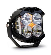 Load image into Gallery viewer, Baja Designs LP4 Pro Driving/Combo LED light featuring a clear lens and durable black housing for enhanced visibility.