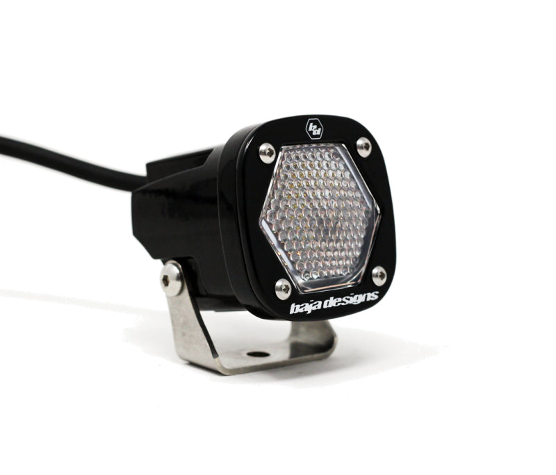 Baja Designs S1 Work/Scene LED light with a mounting bracket, featuring a compact design and hexagonal lens.