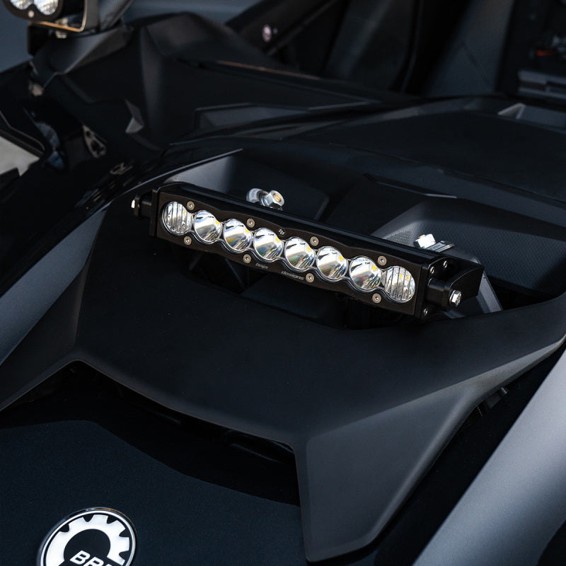Clear 10-inch S8 Shock Tower Kit for Can-Am Maverick R featuring six high-intensity LED lights mounted on the vehicle.