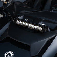 Load image into Gallery viewer, Clear 10-inch S8 Shock Tower Kit for Can-Am Maverick R featuring six high-intensity LED lights mounted on the vehicle.