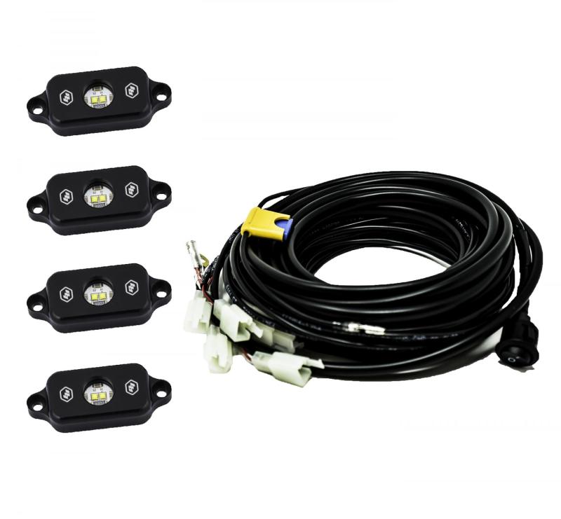 Baja Designs Universal Red Rock Light Kit featuring four LED light pods and wiring harness for offroad illumination.