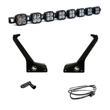 Load image into Gallery viewer, Baja Designs Jeep JL/JT Roof Bar LED Light Kit featuring eight linkable XL lights, mounting brackets, and wiring harness.