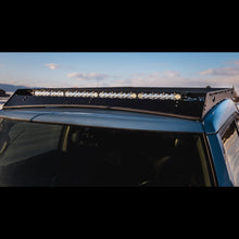 Load image into Gallery viewer, Baja Designs S8 40" LED light bar mounted on a vehicle roof, providing enhanced visibility for offroad adventures.